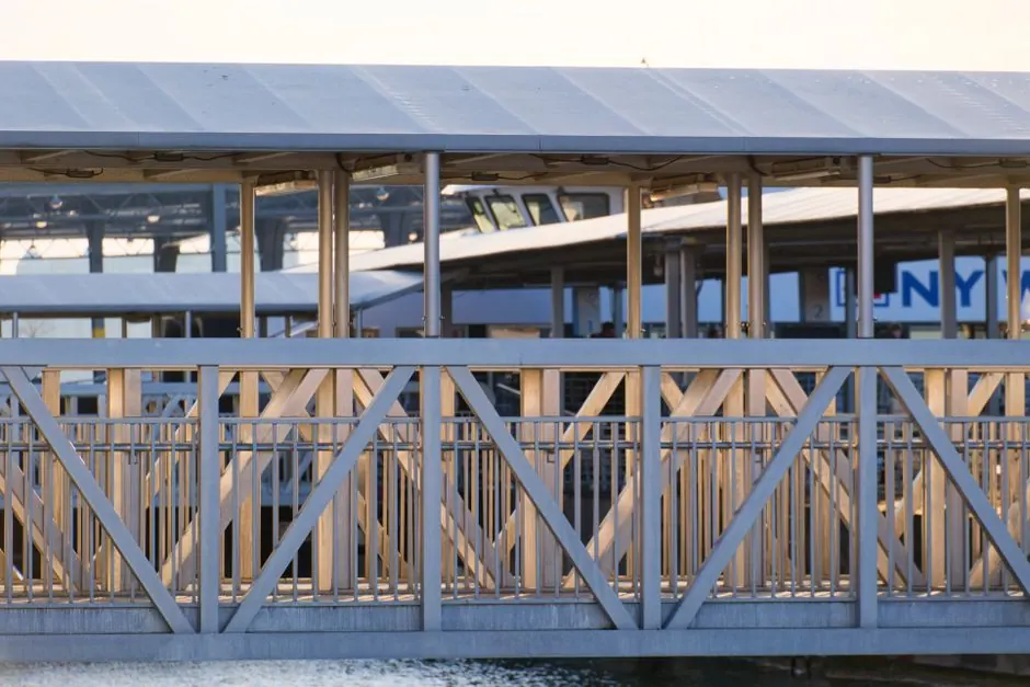 Close-up of a modern metal bridge in New York City, showcasing urban infrastructure.